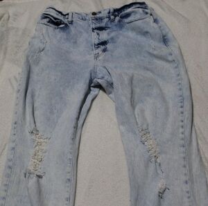 Woman's ripped jeans SIZE 12